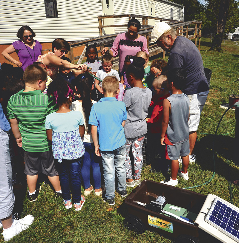 兰森小学使用太阳能光伏水泵系统对花园进行灌溉